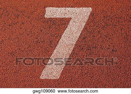 Stock Image - Track number 7 of a running track. Fotosearch