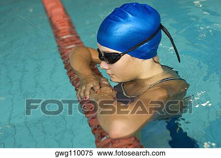 Close-up of a teenage girl in a swimming pool View Large Photo Image Stock Photography - Close-up of a teenage girl in a swimming pool. Fotosearch