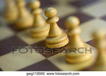 Close-up of chess pieces on a chess board View Large Photo Image Stock Image - Close-up of chess pieces on a chess board. Fotosearch