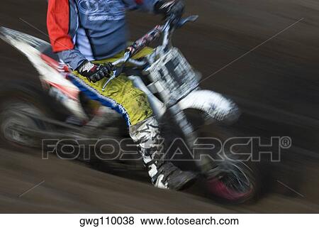 Stock Photo - Low section view of a man on a racing bike. Fotosearch