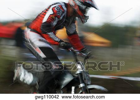 Side profile of a man on a racing bike View Large Photo Image Stock Image - Side profile of a man on a racing bike. Fotosearch