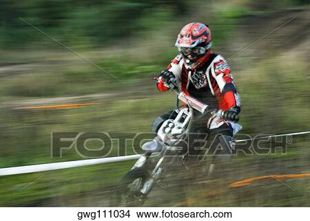 Close-up of a man on a racing bike View Large Photo Image Picture - Close-up of a man on a racing bike. Fotosearch
