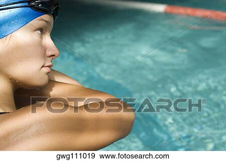 Stock Photo - Close-up of a teenage girl with her arms crossed. Fotosearch