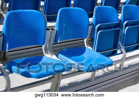 Chairs in a stadium View Large Photo Image Picture - Chairs in a stadium. Fotosearch