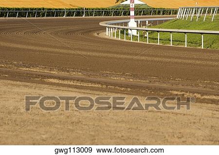 Empty horseracing track in a stadium View Large Photo Image Stock Photo - Empty horseracing track in a stadium. Fotosearch