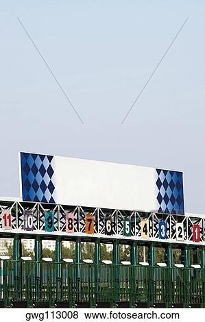 Empty starting gates at the horseracing track View Large Photo Image Stock Photo - Empty starting gates at the horseracing track. Fotosearch
