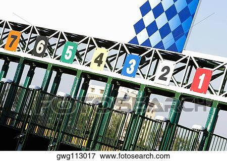 Empty starting gates at the horseracing track View Large Photo Image Stock Photo - Empty starting gates at the horseracing track. Fotosearch