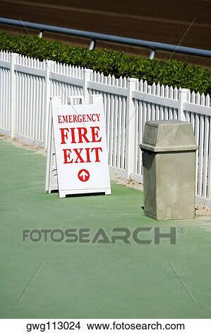 Fire exit signboard on the road View Large Photo Image Picture - Fire exit signboard on the road. Fotosearch