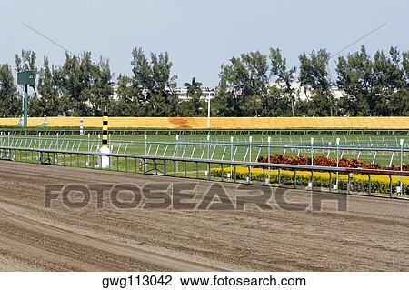 Railing along a horseracing track View Large Photo Image Stock Image - Railing along a horseracing track. Fotosearch