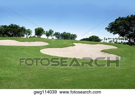 Sand traps in a golf course View Large Photo Image Stock Photo - Sand traps in a golf course. Fotosearch