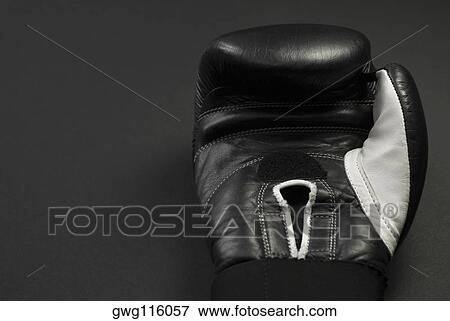 Close-up of a black boxing glove View Large Photo Image Stock Photo - Close-up of a black boxing glove. Fotosearch