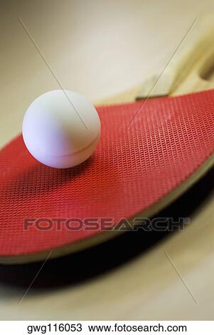 Close-up of a table tennis ball with a table tennis racket View Large Photo Image Stock Image - Close-up of a table tennis ball with a table tennis racket. Fotosearch