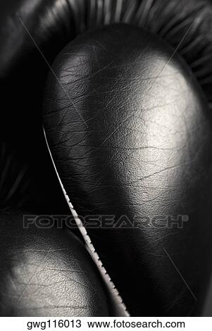 Close-up of boxing gloves View Large Photo Image Stock Image - Close-up of boxing gloves. Fotosearch