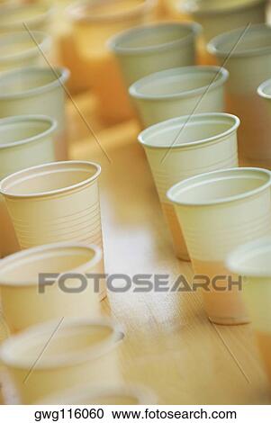 Close-up of disposable cups on a table View Large Photo Image Stock Image - Close-up of disposable cups on a table. Fotosearch