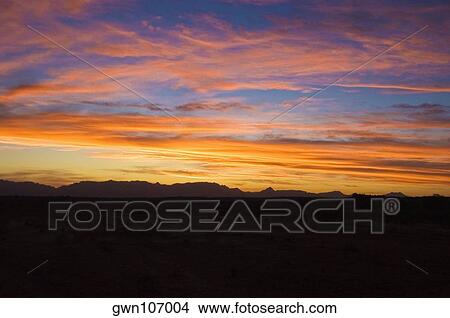 Clouds over mountains at sunset, Drakensberg, South Africa View Large Photo Image Picture - Clouds over mountains at sunset, Drakensberg, South Africa. Fotosearch
