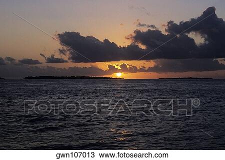 Sunset over the sea, Indian Ocean, Maldives View Large Photo Image Stock Image - Sunset over the sea, Indian Ocean, Maldives. Fotosearch
