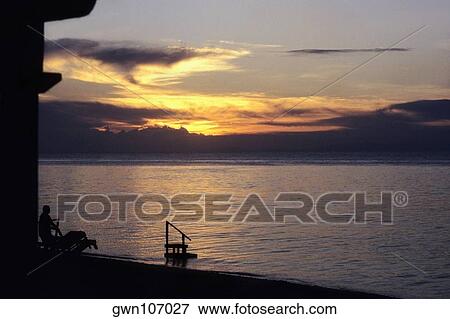 Stock Photo - Sunset over the sea, Sipadan, Borneo, Malaysia. Fotosearch
