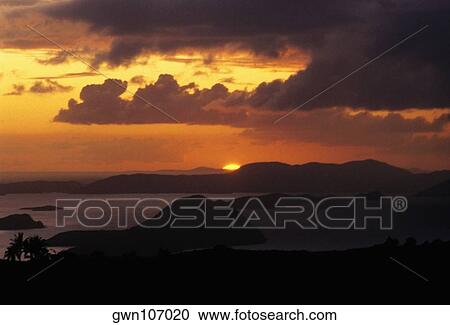 Stock Image - Sunset over the sea, West End, Tortola, British Virgin Islands. Fotosearch