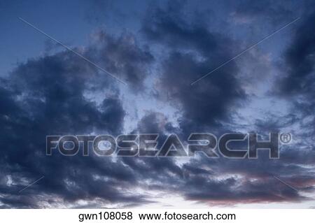 Clouds in the sky View Large Photo Image Stock Photo - Clouds in the sky. Fotosearch