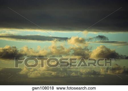 Stock Photo - Cloudscape in the sky, Mawi, Hawaii Islands, USA. Fotosearch