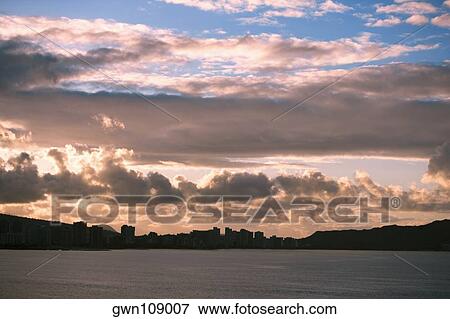 Clouds over mountains, Honolulu Harbor, Honolulu, Oahu, Hawaii Islands, USA View Large Photo Image Stock Photo - Clouds over mountains, Honolulu Harbor, Honolulu, Oahu, Hawaii Islands, USA. Fotosearch