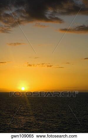 Stock Photography - Sunset over the sea, Hawaii Islands, USA. Fotosearch
