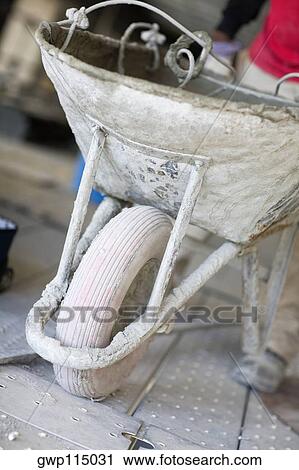 Close-up of a wheelbarrow View Large Photo Image Stock Image - Close-up of a wheelbarrow. Fotosearch