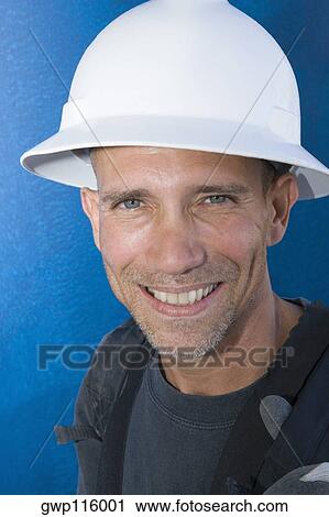 Portrait of a mature man smiling View Large Photo Image Stock Image - Portrait of a mature man smiling. Fotosearch