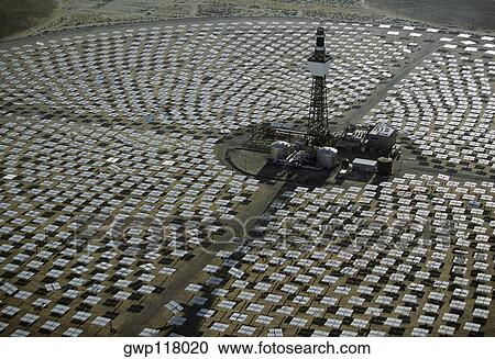 Stock Image - Field of solar-power 10 megawatt heliostat mirrors, Daggett, California. Fotosearch