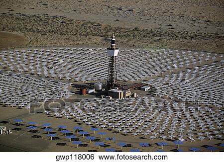 Stock Photograph - Field of solar-power 10 megawatt heliostat mirrors, Daggett, California. Fotosearch