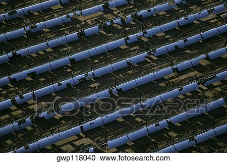 Solar power via parabolic trough mirrors, Daggett, California View Large Photo Image Stock Image - Solar power via parabolic trough mirrors, Daggett, California. Fotosearch