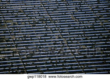Solar power via parabolic trough mirrors, Daggett, California View Large Photo Image Stock Photo - Solar power via parabolic trough mirrors, Daggett, California. Fotosearch