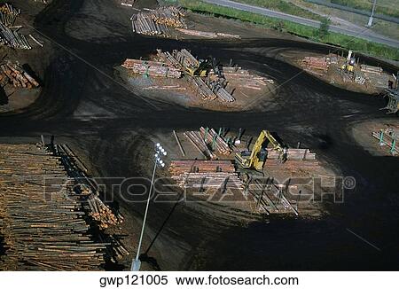 Sawmill log handler at work, Idaho View Large Photo Image Stock Photography - Sawmill log handler at work, Idaho. Fotosearch