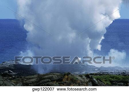 Steam rises from lava flowing into the sea, Hawaii View Large Photo Image Stock Photo - Steam rises from lava flowing into the sea, Hawaii. Fotosearch