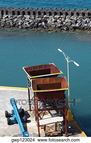 High angle view of a crane and towers at a commercial dock View Large Photo Image Picture - High angle view of a crane and towers at a commercial dock. Fotosearch