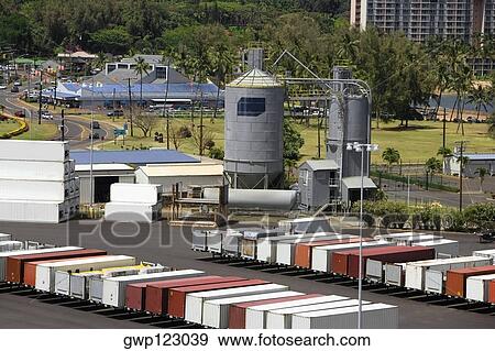 High angle view of cargo containers and a storage tank at a commercial dock View Large Photo Image Stock Photo - High angle view of cargo containers and a storage tank at a commercial dock. Fotosearch