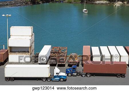 Picture - High angle view of cargo containers at a commercial dock. Fotosearch
