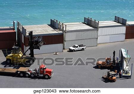 High angle view of semi-trucks and forklifts at a commercial dock View Large Photo Image Stock Image - High angle view of semi-trucks and forklifts at a commercial dock. Fotosearch