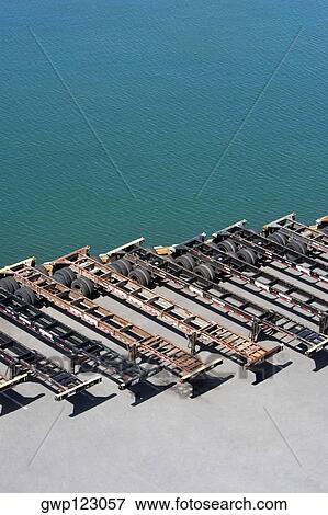 High angle view of vehicle trailers at a commercial dock View Large Photo Image Stock Photo - High angle view of vehicle trailers at a commercial dock. Fotosearch