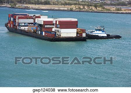 Stock Photo - Container ship in the sea, Mawi, Hawaii Islands, USA. Fotosearch