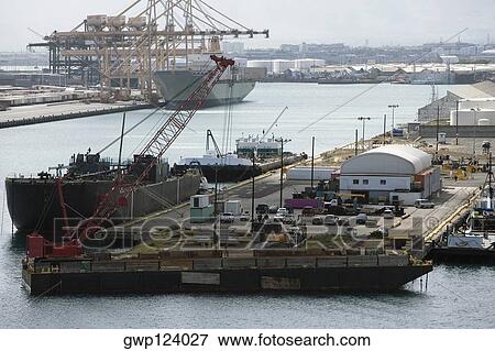 Stock Photo - Container ships at a commercial dock. Fotosearch