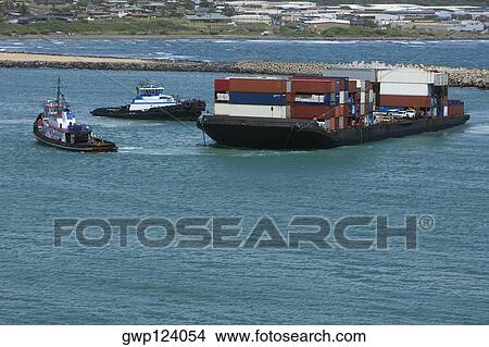 Container ships in the sea View Large Photo Image Picture - Container ships in the sea. Fotosearch