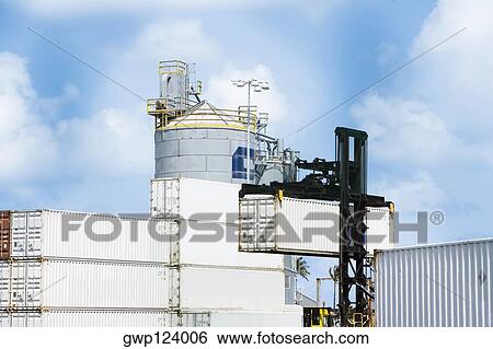 Crane and cargo containers at a commercial dock, Hawaii Islands, USA View Large Photo Image Stock Photograph - Crane and cargo containers at a commercial dock, Hawaii Islands, USA. Fotosearch