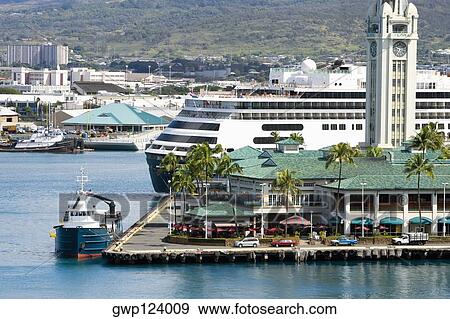 Cruise ship at a harbor, Honolulu Harbor, Honolulu, Oahu, Hawaii Islands, USA View Large Photo Image Stock Photo - Cruise ship at a harbor, Honolulu Harbor, Honolulu, Oahu, Hawaii Islands, USA. Fotosearch