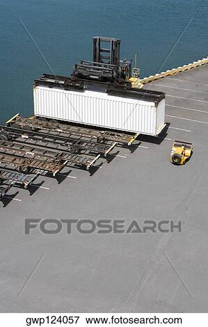 High angle view of a cargo container at a commercial dock View Large Photo Image Stock Photo - High angle view of a cargo container at a commercial dock. Fotosearch
