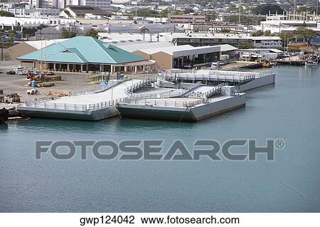 Stock Image - High angle view of cargo containers at a commercial dock. Fotosearch