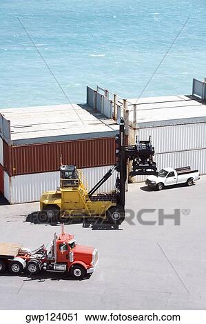 High angle view of cargo containers at a commercial dock View Large Photo Image Stock Image - High angle view of cargo containers at a commercial dock. Fotosearch