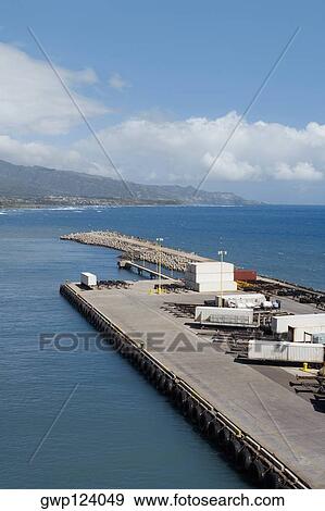 Stock Photo - High angle view of cargo containers at a commercial dock. Fotosearch