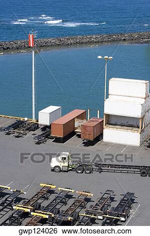 High angle view of cargo containers at a commercial dock View Large Photo Image Stock Photograph - High angle view of cargo containers at a commercial dock. Fotosearch