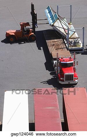 High angle view of cargo containers at a commercial dock View Large Photo Image Stock Photograph - High angle view of cargo containers at a commercial dock. Fotosearch